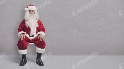 Preview: Bored Santa Claus sitting and waiting