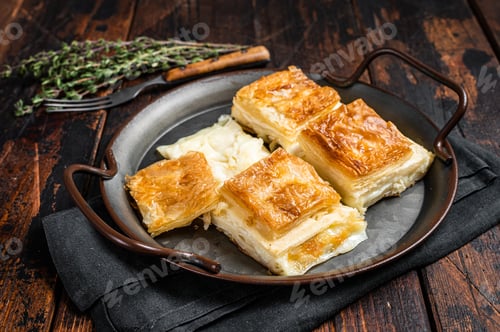 Preview: Turkish Su Boregi, Tabla borek or Adana Borek with cheese. Wooden background. Top view. Copy space