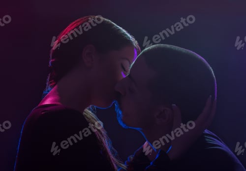 Preview: Young Adult Caucasian, Straight (Heterosexual) Couple, Man And Woman, Sensual Kissing. Black