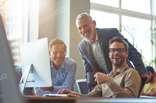 Preview: Happy business people. Three cheerful men looking at camera and smiling while sitting at desk and