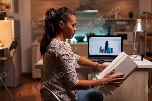 Preview: Architect holding building model