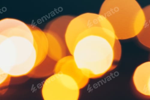 Preview: Abstract Gold bokeh sparkle on dark background