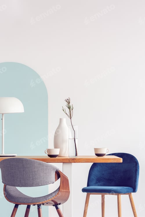 Preview: Minimalist Interior with Wooden Table and Modern Chairs
