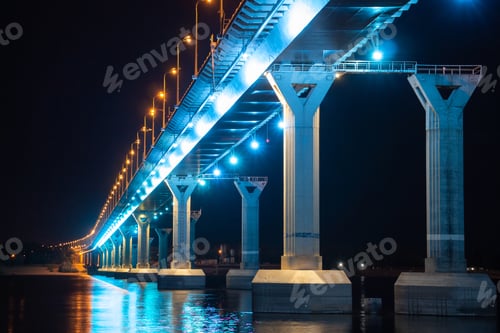 Preview: Blue-colored bridge at night