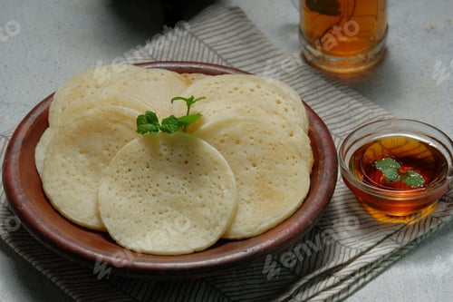 Preview: Moroccan pancakes, Arabic pancakes - Baghrir served with honey and mint tea