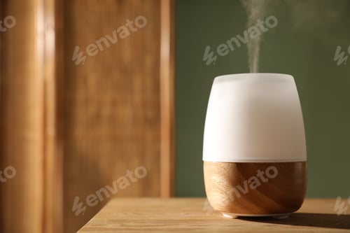Preview: One stylish aroma lamp on wooden table indoors, closeup. Space for text