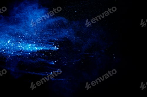 Preview: Blue color powder explosion cloud on black background. Closeup of Blue dust particles splash.