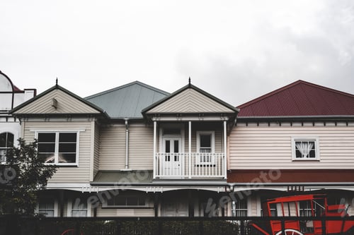 Preview: Facade of cottage and retro carriage