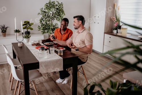 Preview: Couple enjoying a cozy dinner at home in a warm and inviting dining area during the evening