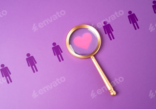 Preview: Search for love and dating. Magnifying glass finds the heart of love among