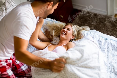Preview: Lovely young couple in the bed