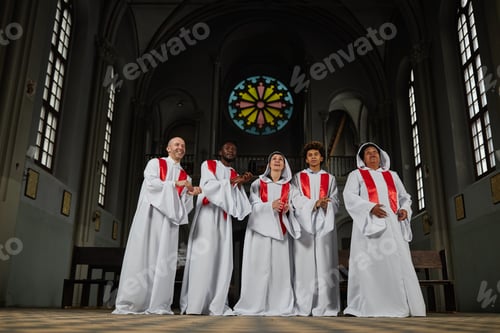Preview: People in white costumes singing in church choir