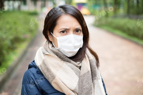Preview: Woman wear facemask outdoor
