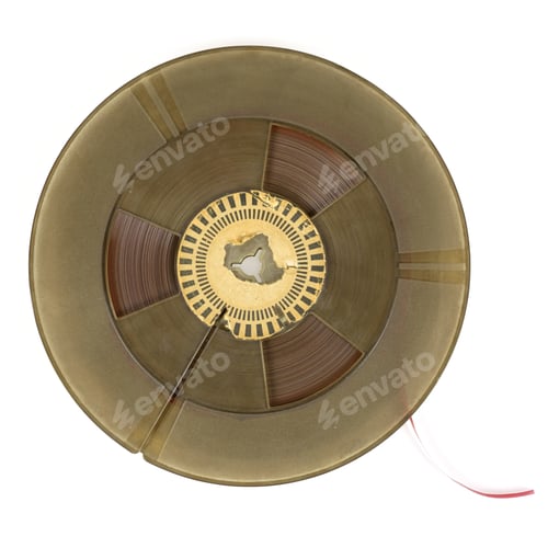 Preview: Reel of vintage audio tape on white background