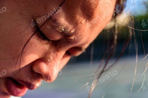Preview: Closeup sweating on face asian women . Exercise on park