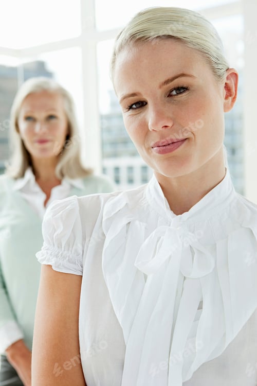 Preview: Two businesswomen in office, portrait