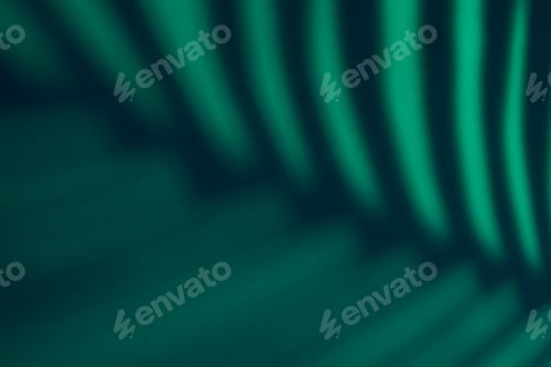 Preview: Beautiful monstera leaves shadow colored background in artificial light