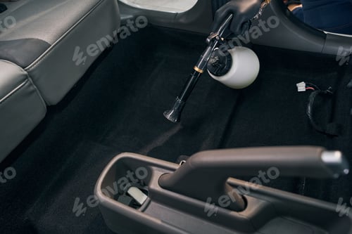 Preview: Chemical cleaning of car carpet in workshop. Auto service cleanup