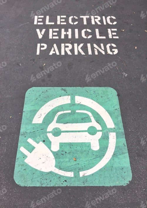 Preview: Designated Electric vehicle parking space with words and symbols painted on the ground