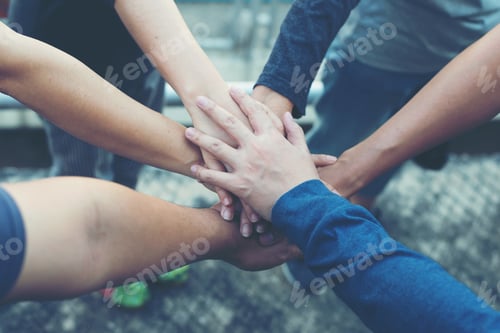 Preview: Hands were a collaboration concept of teamwork. Business people.