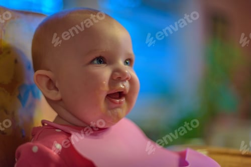 Preview: Baby in a high chair
