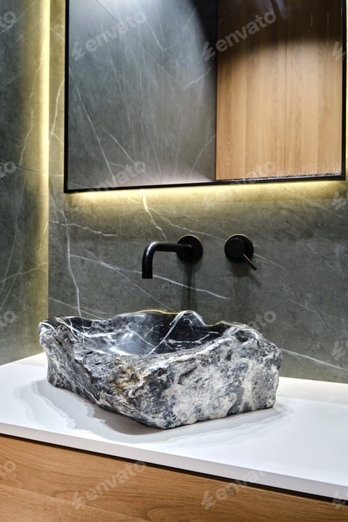 Preview: Elegant stone sink design in modern bathroom showcasing minimalist aesthetics