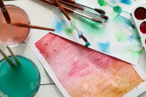 Preview: Watercolor Painting Supplies with Brushes and Artwork
