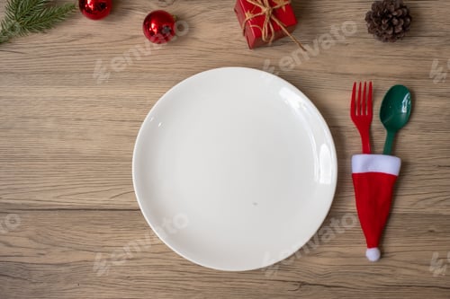 Vista previa: Feliz Navidad con plato, tenedor y cuchara