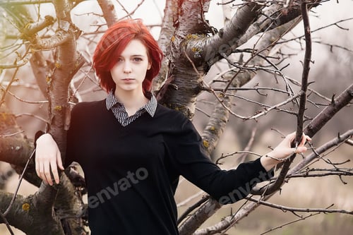Preview: Portrait of a young redhead woman