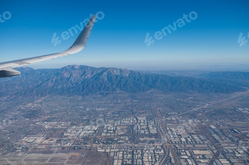 Preview: Airplane wing seen flying over Los Angeles