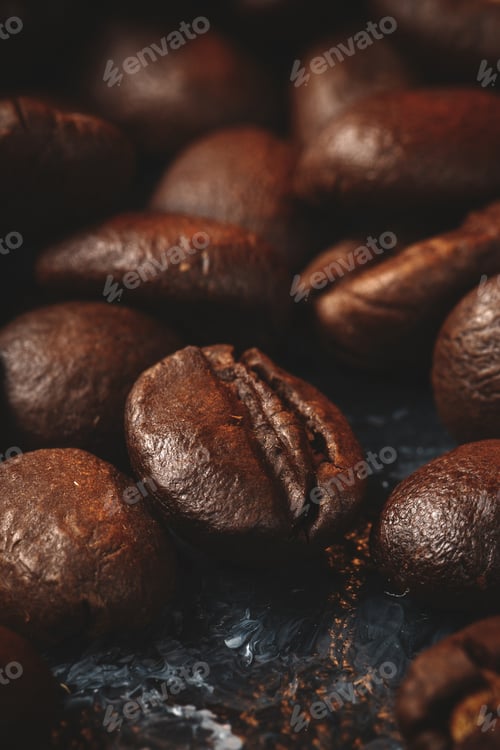 Preview: close up view of brown coffee seeds dark surface textured group cocoa grain