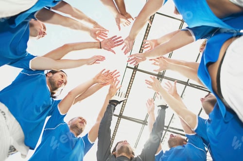 Preview: Football team raising their arms