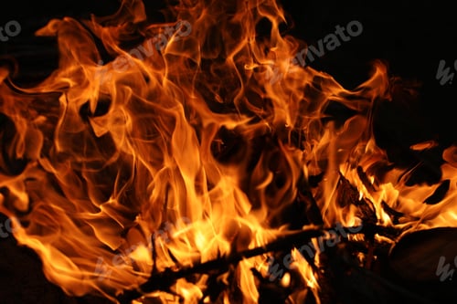 Preview: Fire flames on black background. The fire in the natural forest, flames and sparks on a dark