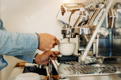 Preview: Cup and professional espresso machine pouring fresh coffee into a ceramic cup