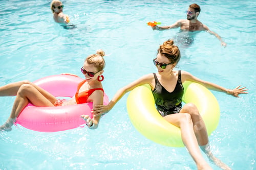 Preview: Friends playing in the swimming pool