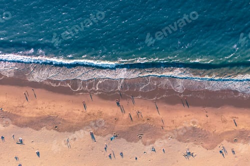 Preview: Aerial looking down view of people enjoying the beach in California