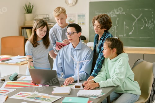 Preview: Middle Aged Caucasian Woman Teaching Diverse Teenagers About Wind Energy