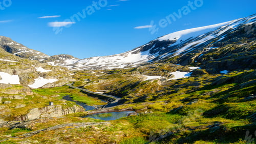 Preview: Nature in Norway. Panoramic view of wild Norway. Road among the rocks and mountains.