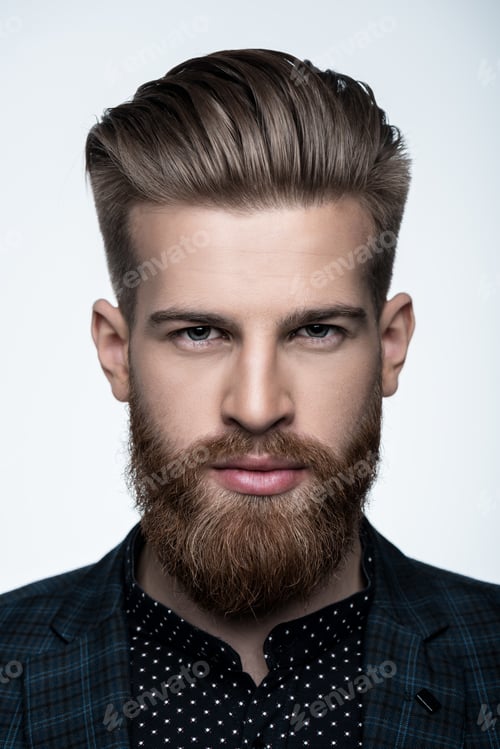 Preview: portrait of confident stylish bearded man in suit isolated on white