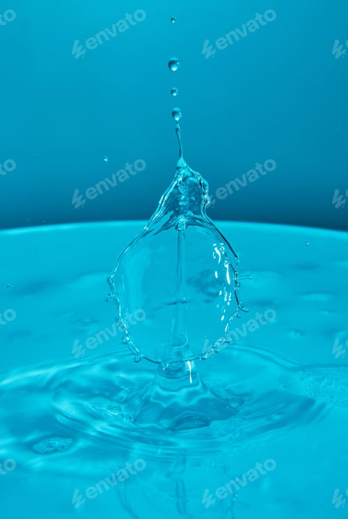 Preview: Abstract background of splash of color water, collision of colored drops, the concept