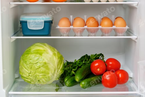 Preview: Well-Stocked Refrigerator With Fresh Produce, Eggs, and Other Groceries