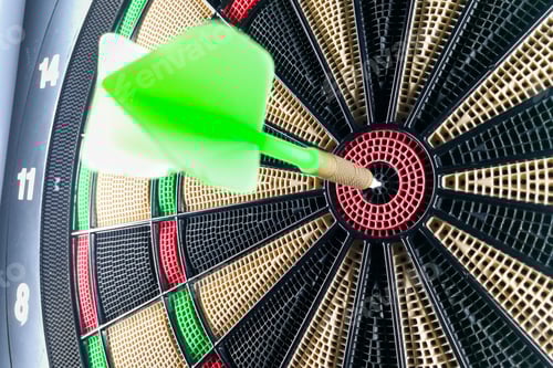 Preview: Close-up on dart pin on board bullseye