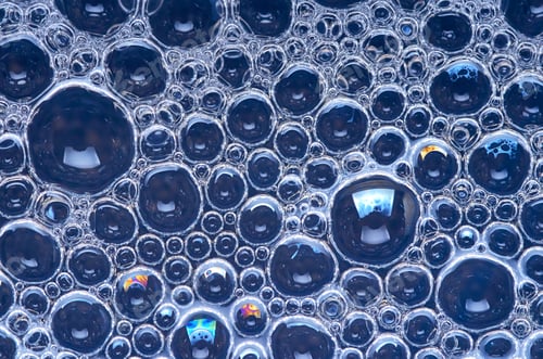Preview: Background close-up view of soup suds