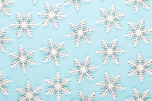 Preview: Christmas background. White snow decorations on a pink background.