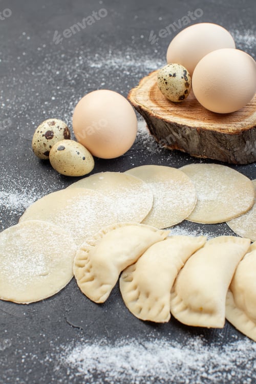 Preview: front view raw potato hotcakes with eggs and flour on dark background pie dough cooking biscuit oven
