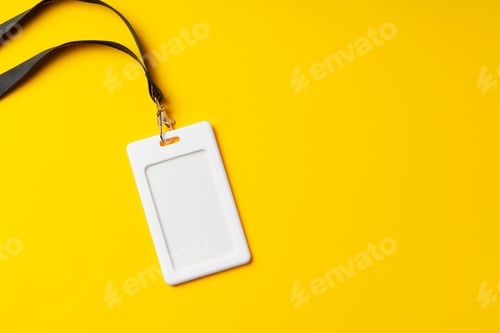 Preview: Blank nametag on a string on yellow background copy space
