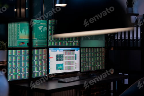 Preview: Interior of empty forex stock market workstation with multiple display and index charts.
