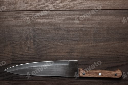 Preview: Kitchen Knife On Brown Wooden Table