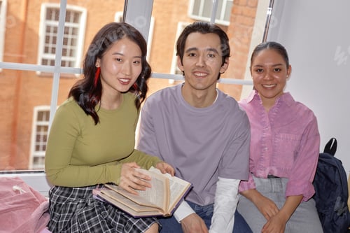 Preview: Young College Girls and Boy Studying Together