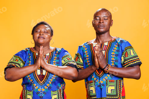 Preview: Couple standing with folded palms